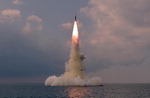 북한 “SLBM, 잠수함서 발사”…김정은은 참관 않아